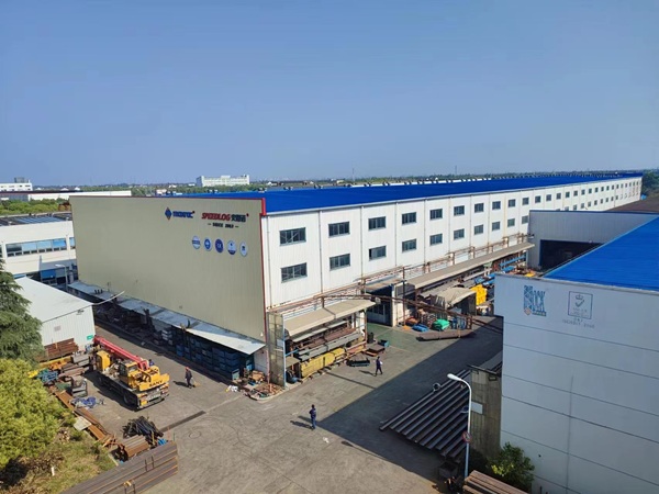 Exterior view of a warehouse racking manufacturing factory and production facility. Exterior view of a warehouse racking manufacturing factory and production facility.